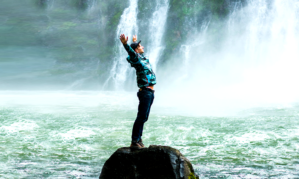 Digit89 - Bring your business some oxygen - man standing in front of a waterfall